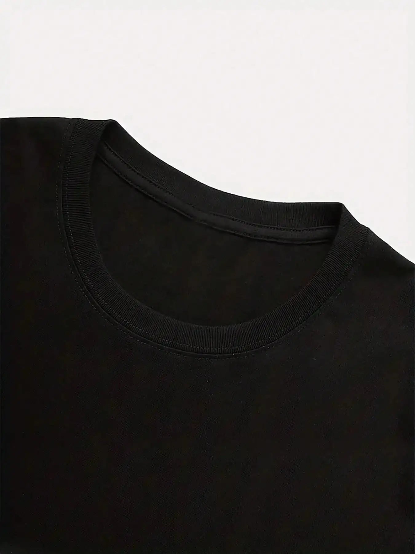 Black Short-Sleeve Crew Neck Graphic Tee with Bold Lettering and Cross Design